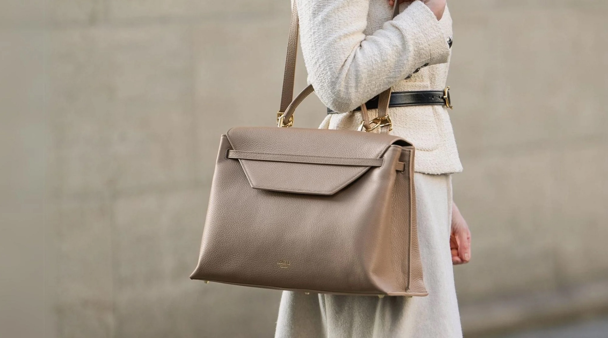 Woman with a leather handbag